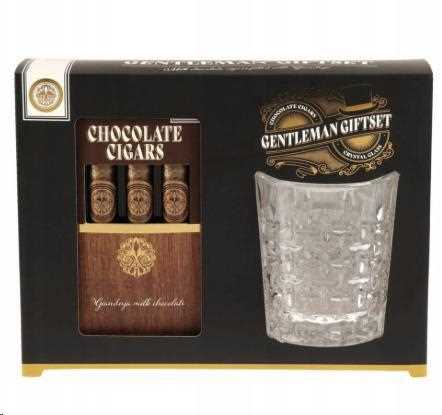 BICCHIERE DA WHISKY CON whisky SIGARI DI CIOCCOLATO